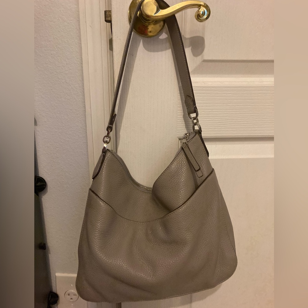 Kate spade gray leather purse used in really good condition.